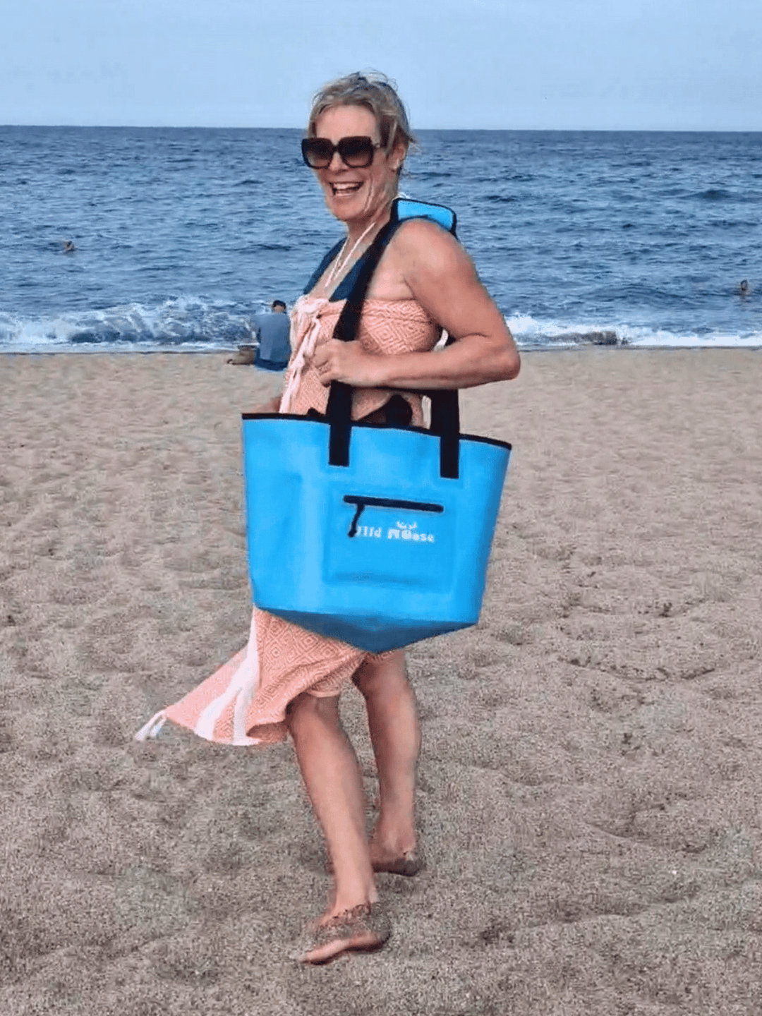 Fully waterproof roll-top tote bag, made from recycled fabric - ideal for the beach