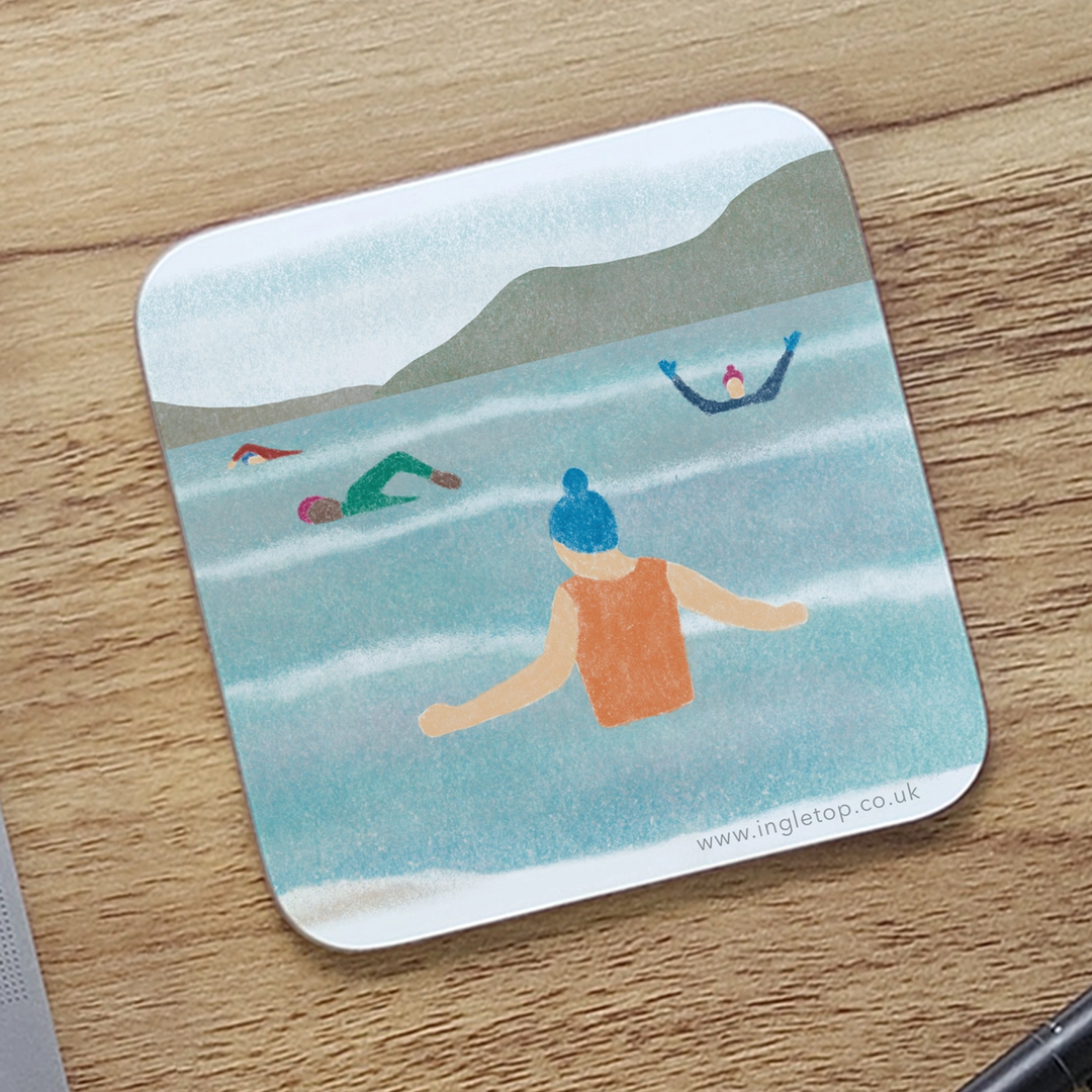 Wild Swimming coaster features an illustration of a group of outdoor swimmers enjoying an invigorating dip