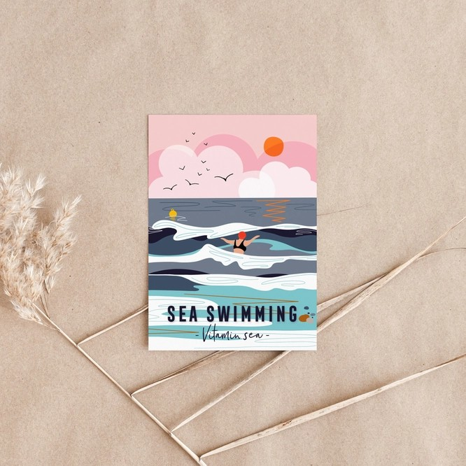 Illustrated swim print by Onneke featuring a sea swimmer and sunset skies – sustainably produced in the UK and ideal for ocean lovers.