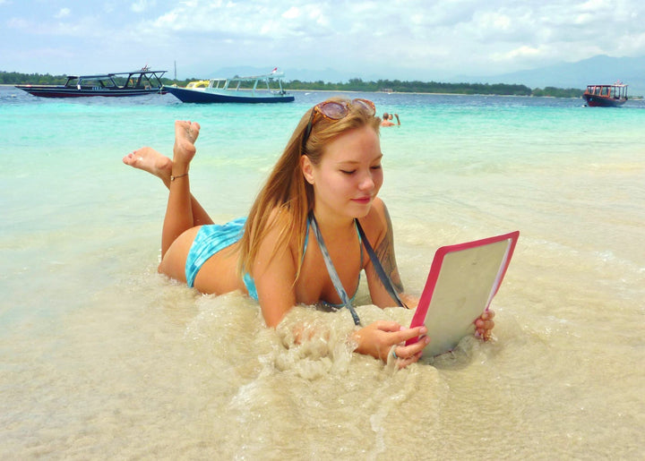 SwimCell Small Tablet waterproof case in the sea