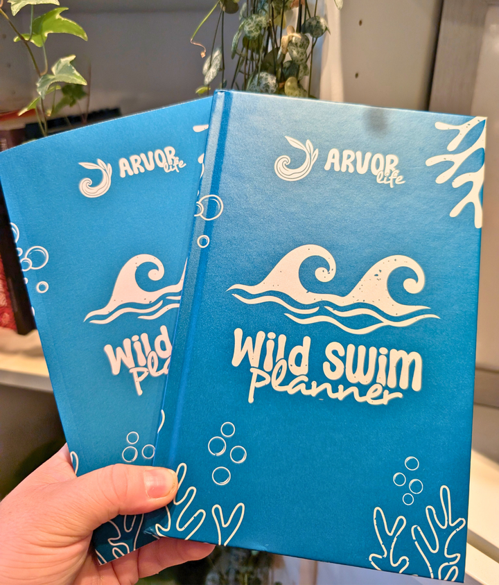 Arvor Life Wild Swim Planner for wild swimming and cold water swim adventures, blue seaside cover.