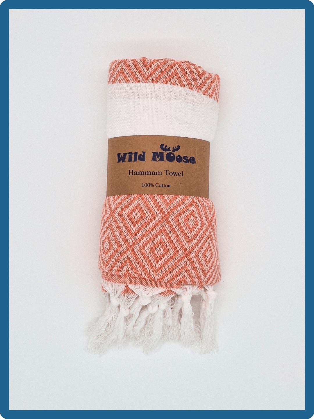 Lightweight cotton hammam towel from Wild Moose in starfish orange