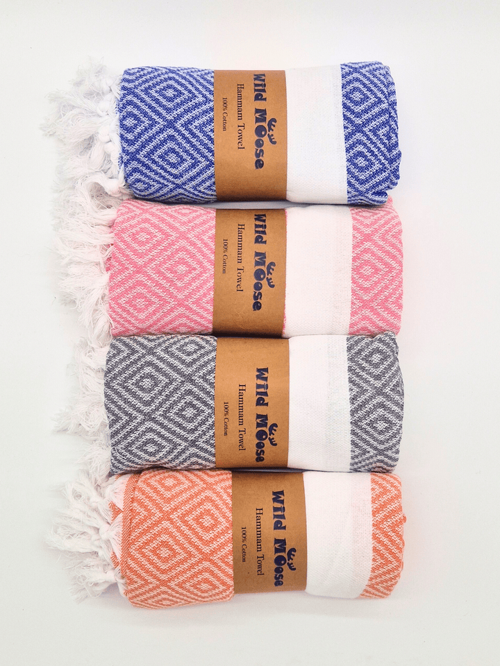 Set of Wild Moose hammam towels in grey, blue, orange and pink