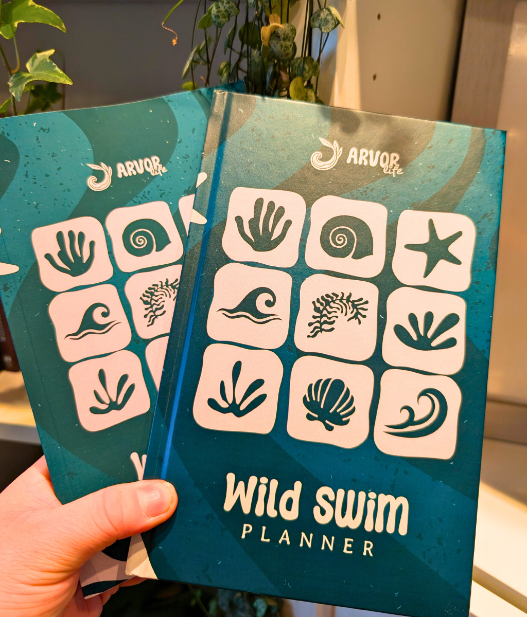 Green Wild Swim Planner for outdoor swimmers with lush nature design by Arvor Life.