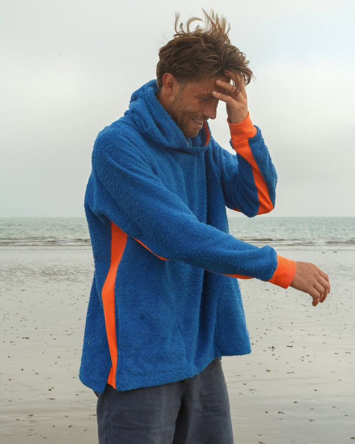 Bright blue and orange Hampstead hoodie by So English, featuring a casual, comfortable design with beachwear style.