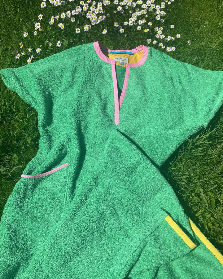 Long fresh green Kiss dress by So English, featuring a stylish beachwear design and elegant fabric, made in the UK.