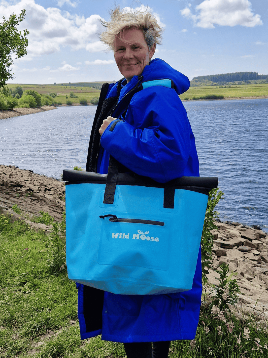 Designed with wild swimmers in mind, the 40L Caribou tote bag packs in plenty of gear and comes with handy pop out pockets to for easy access to your open water essentials