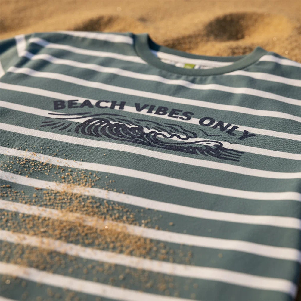 Blue and white striped t-shirt with 'Beach Vibes Only' text and wave graphic on a white background