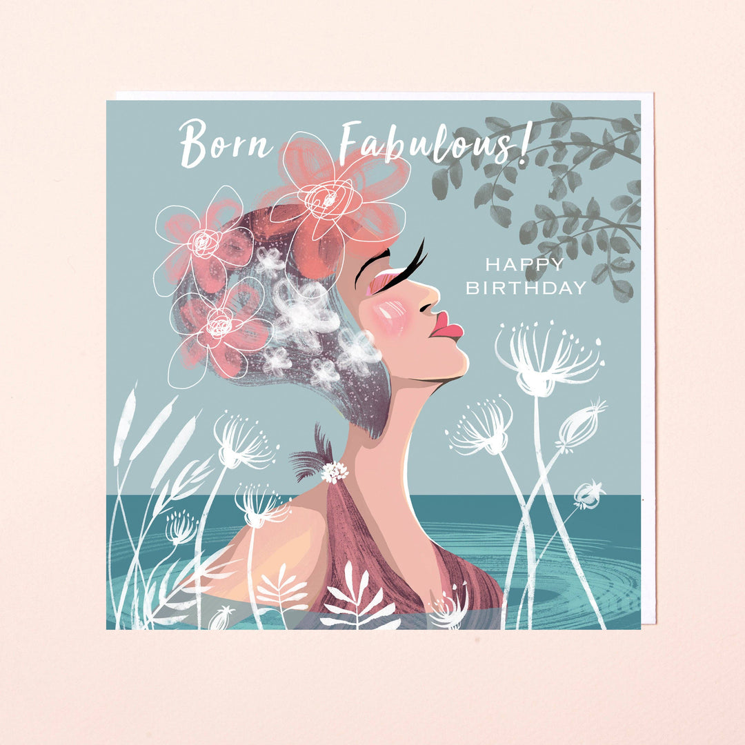 Retro-style Lydia. London birthday card featuring a glamorous outdoor swimmer surrounded by flowers and water, with the words Born Fabulous and Happy Birthday