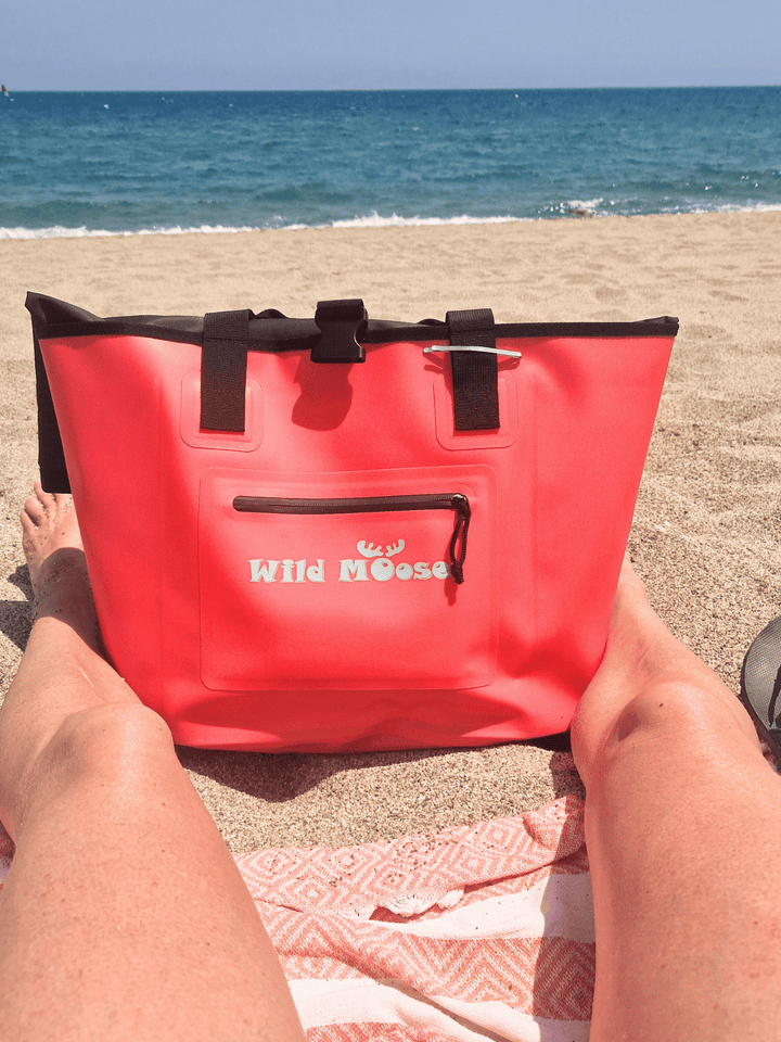 Waterproof tote bag ideal for beach days and open water swimmers. Comes with a removable 5L recycled ripstop dry bag for easy storage of wet items