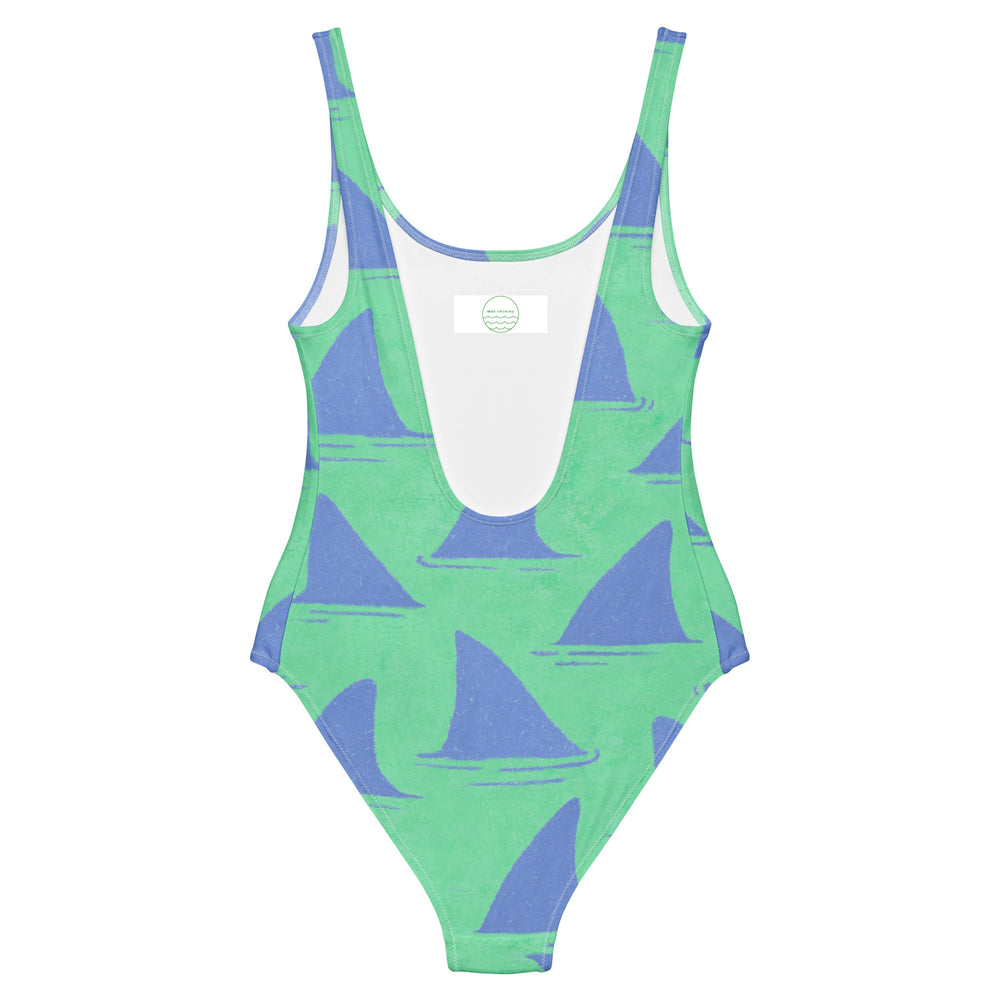 Back image of the Fins Swimsuit by Mor Swimmy — green and blue one-piece featuring hand-drawn shark fin design, perfect for wild swimming.
