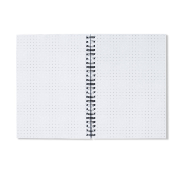Inside pages of Pause Breathe Reset wild swimming notebook with graph paper