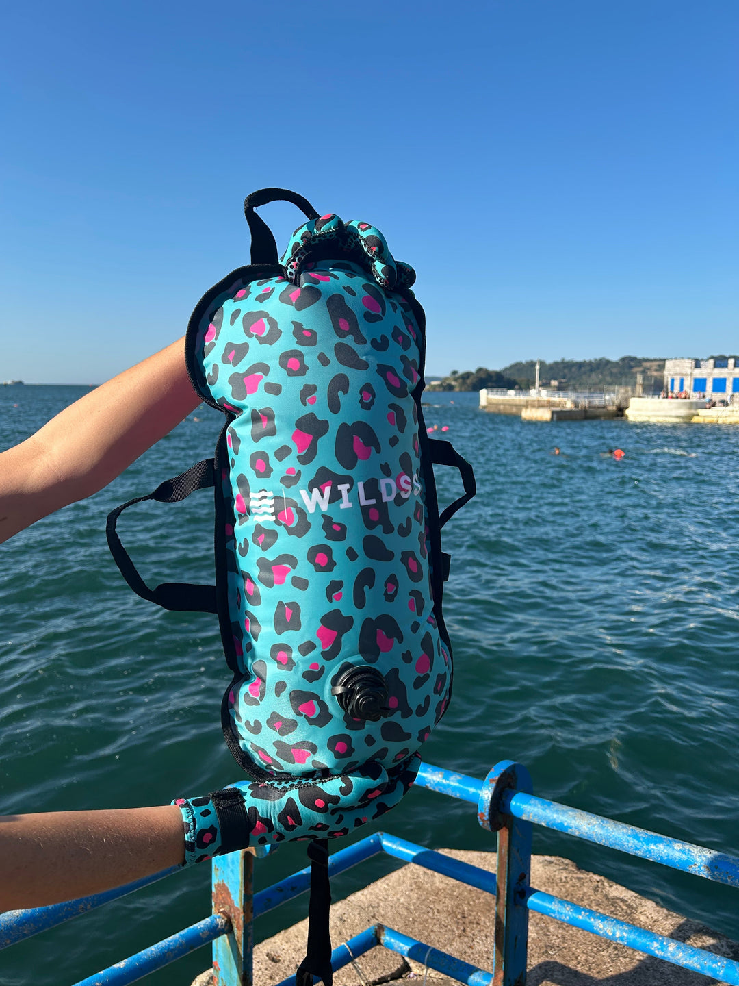 Wild Swimming Socks blue leopard print tow float with built-in thermometer.