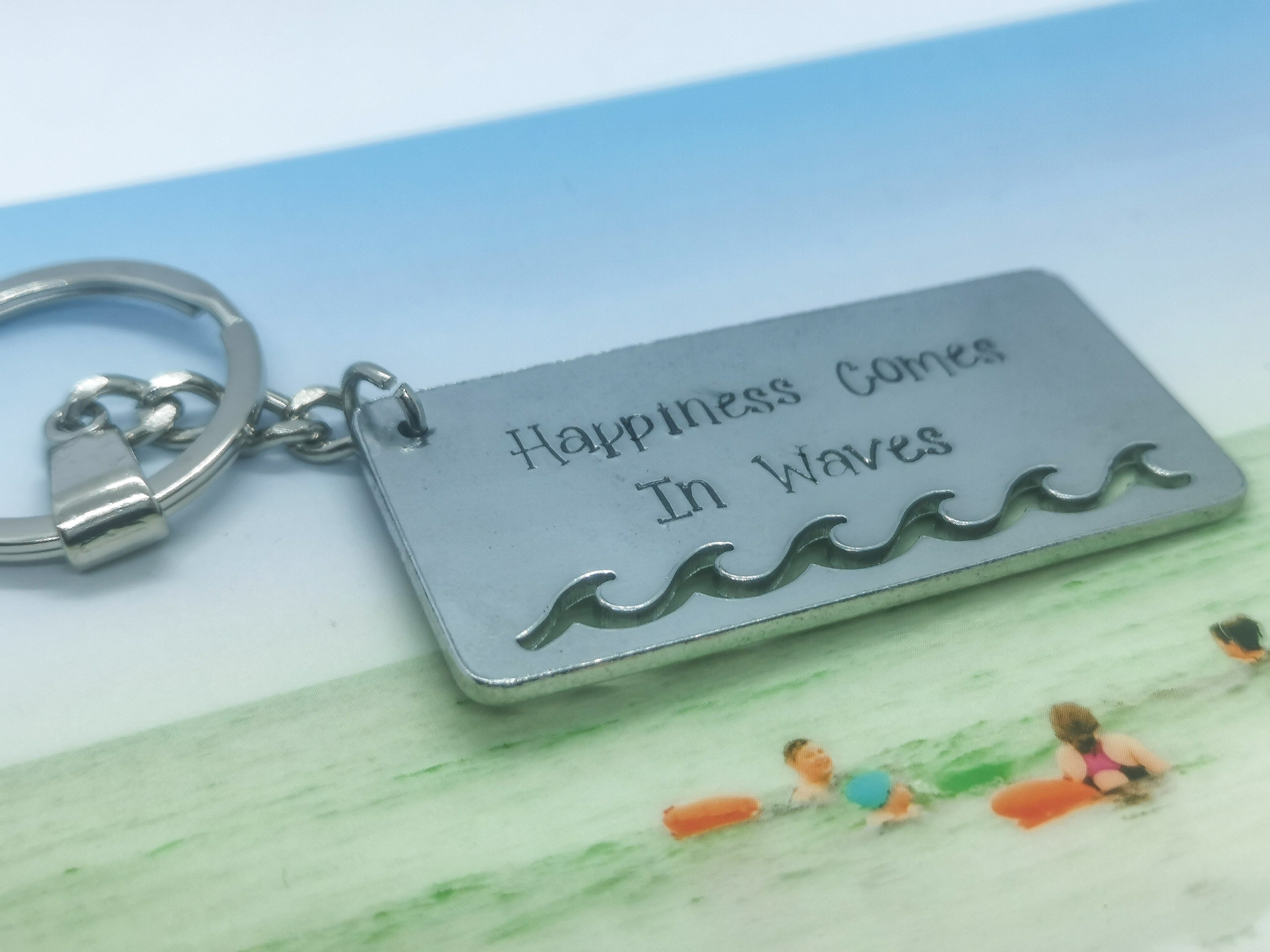 'HAPPINESS COMES IN WAVES' Keyring – Outdoor Swimmer Shop